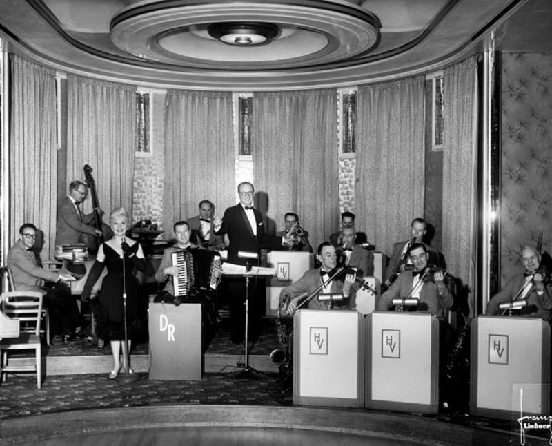 The Dal Richards Orchestra at the Panorama Room in the Hotel Vancouver. Richards led the orchestra from the 1940s, when mixing music, dancing, and alcohol was still taboo in Vancouver. Photo by Franz Lindner, May 1960, for the CBC.
