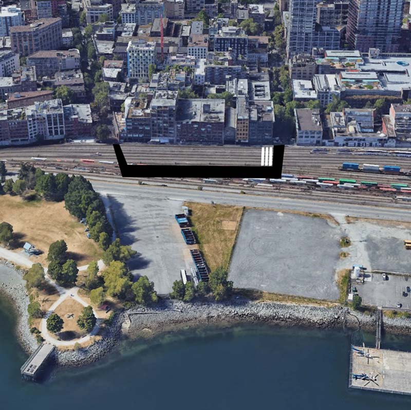 The approximate location of Cut-Throat Johnny's today, from Google Earth. The black bars represent the City wharf, and the white bars the 3 rows of cabins that made up Cut-Throat Johnny's.
