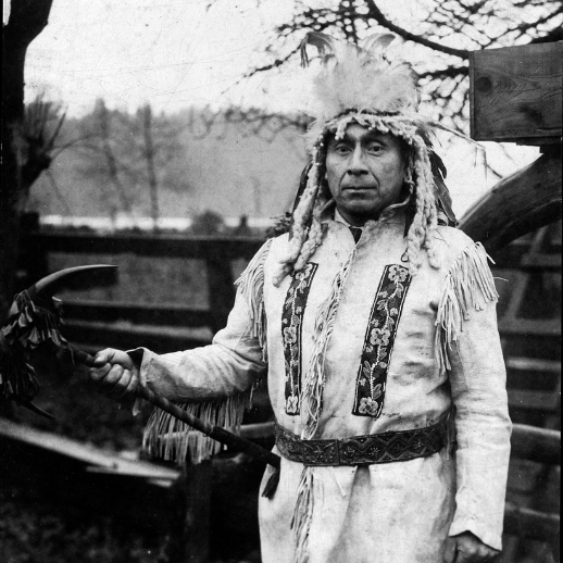 Chief Joe Capilano in traditional headdress Joe Capilano poses for a photo in full headress